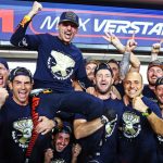 Max Verstappen celebrates clinching his third world championship with his Red Bull team following the sprint race at the Qatar Grand Prix.