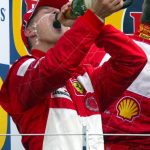 Schumacher in his heyday as he celebrates his win at the British Grand Prix in 2004
