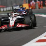 Kevin Magnussen’s Haas burst into flames after crashing into the safety barriers
