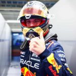 Red Bull’s Max Verstappen gives a thumbs up after sealing pole at at Interlagos
