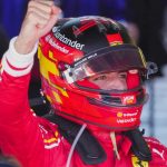 Ferrari driver Carlos Sainz of Spain celebrates after winning the Australian Formula One Grand Prix at Albert Park, in Melbourne