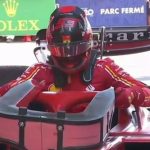 Carlos Sainz struggled as he clambered out of his Ferrari