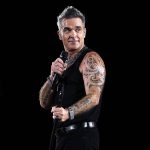 A promoter is suing the Australian Grand Prix operators for $8.7million over the last minute cancellation of a concert featuring British pop star Robbie Williams